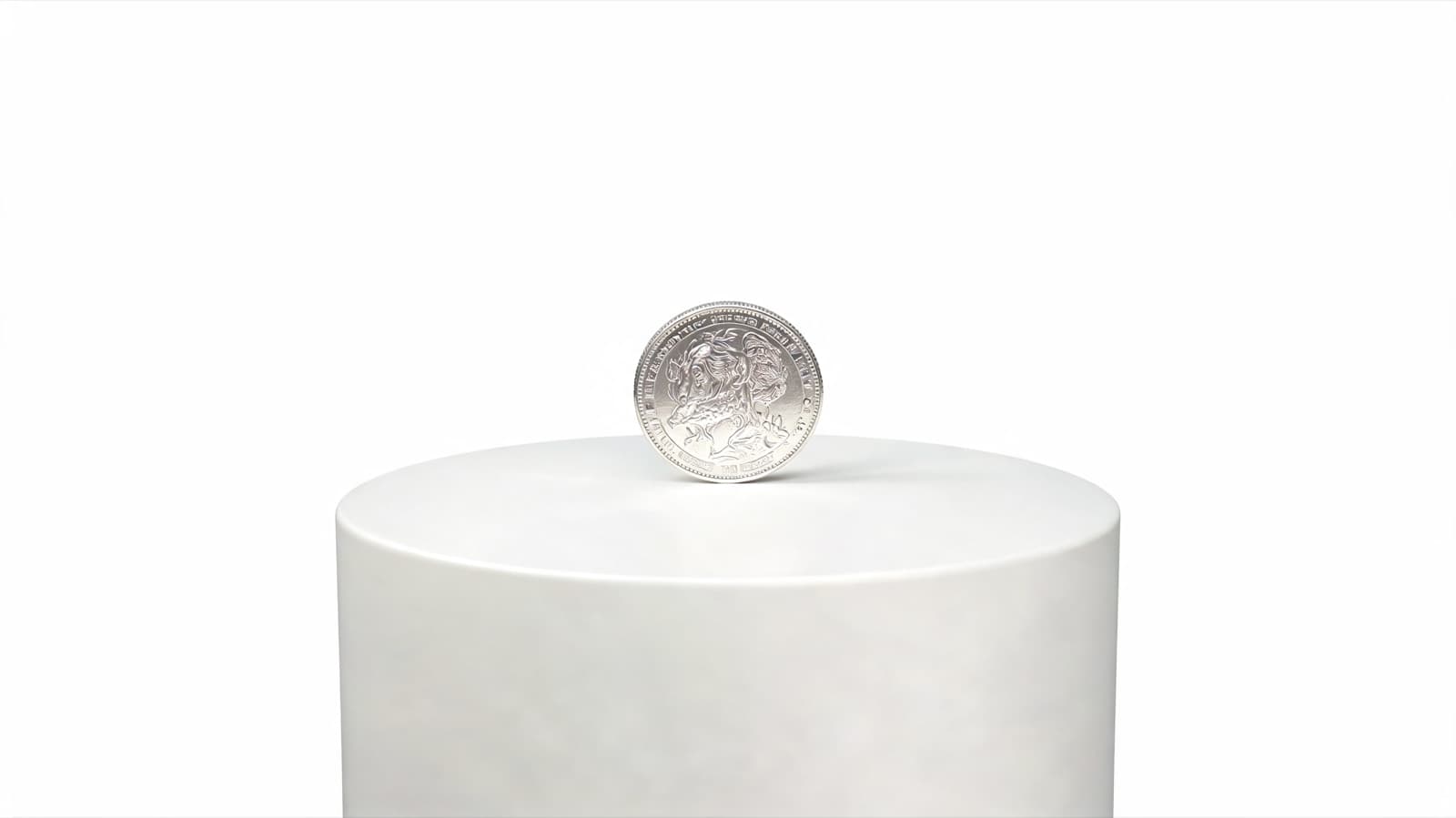Single silver coin on a tall white plinth